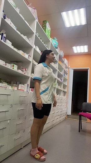 Pharmacy Employee in Uniform: A Visual Overview