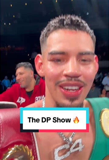 Diego Pacheco Celebrates Victory in Boxing Match