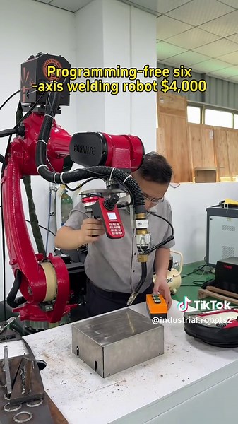 Welding robot. #weldingrobot #industrial robot #factory #sixaxisrobot
