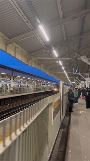 Class 444 passing Wimbledon station Pirde livery