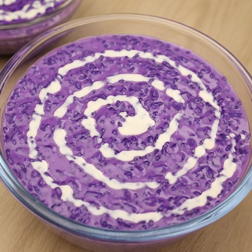 How To Cook Ube Champorado at Home. Champorado is Sweet Sticky Porridge a Pinoy dish commonly known using Cocoa But In this Video we will be using Ube Flavor. This Champorado Recipe is Made of Glutinous Rice, Coconut Cream, Ube Condensed, Ube Powder, Water and Salt Top with Evaporated Creamer / Milk. #champorado #ubechamporado #champoradorecipe | FriendCheap Menu