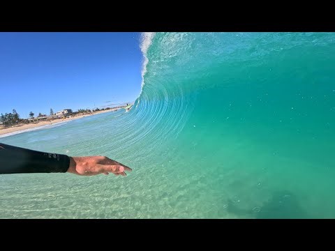 SURFING GLASSY BEACHBREAK *HEAVY CONDITIONS* (AIRS + BARRELS)