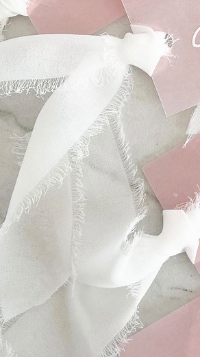 breaking down how to tie the ribbon: 1. cut 11-12 inches of ribbon (or less for shorter ends) 2. fold ribbon in half 3. fold the folded end in half 4. put the folded piece through the hole punch 5. thread the ends of the ribbon through the center of the ribbon 6. pull to tighten ✨💍✔️ side note: you might need to do some extra folding & tucking to get it to look a little neater! making these was honestly so fun and satisfying! I could do this alllll day 😻 #weddingplacecards #placecards #ribbonw