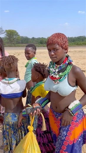 girl dancing in bull jump ceremony in ethiopia