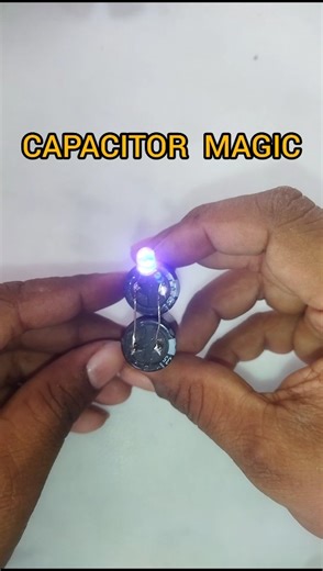 LED Glows with Capacitor 😲 | Simple Electronics Experiment #shorts