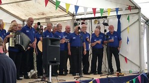 2.2K views · 43 reactions | The Polperro Fisherman’s Choir aka The Wreckers performing on the Festival stage tonight. Brilliant! | Polperro Holiday Cottages, Cornwall | Facebook