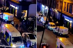 Moment  'mass brawl' breaks out in street ahead of Old Firm as cops make arrests