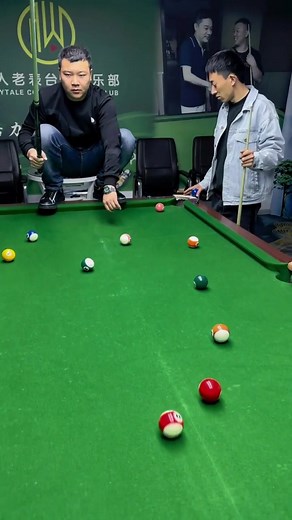 Two Chinese Brothers Play Billiards