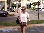Kaley Cuoco arrives to yoga class with yoga mat in hand