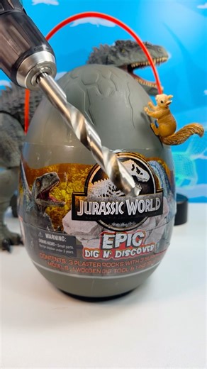 Squirrel Stampede on Instagram: "Jurassic World Dig n’ Discover Egg! 3 permanently stuck in rock dinosaur fossils to uncover! Tyrannosaurus and Velociraptor models inside! Get your hammers and drills at the ready! #jurassicworld #dinosaurs #tyrannosaurus #toys #asmr"