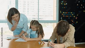 Young smart teacher explain about classwork while student answer questions. Diverse student discuss, brainstorming idea to present smart mentor while writing on paper. Creativity education. Erudition.