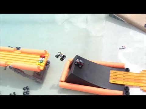 HOT WHEELS MONSTER TRUCKS IN THE POOL
