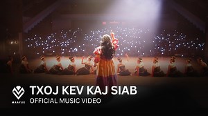 Official Music Video of "Txoj Kev Kaj Siab" (Peace). It is the first release in The Dream Carrier music video series that takes you on a visual journey through the live showcase — revisiting the performance, the audience, and behind-the-scenes moments. This song carries both my story and the Hmong story. It reflects endurance, loss, and the courage to dream again. It marks a moment when survival gives way to peace and healing. The video opens with a line from The Dream Carrier. To me, it reflect