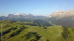 Drone aerial view at Sella group and Marmolada during summer. Alta Badia, Sud Tirol, Dolomites, Italy