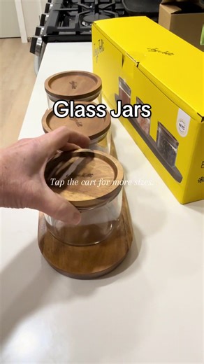Stackable glass storage jars with wood lids that work for snacks, candy, and pantry organizing. @Joyjolt #KitchenOrganization #PantryFinds #HomeEssentials #TikTokShopCreatorPicks #OrganizedHome @Elizabeth @Elizabeth