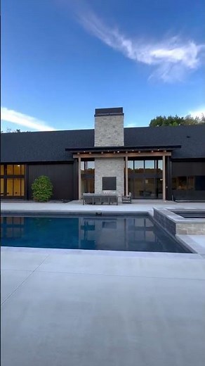 Transform Your Backyard: Discover This Stunning Infinity Pool Paradise with Dreamy Night Lighting!