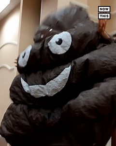 Watch this giant inflatable poop emoji crash a city meeting to protest pig farming | NowThis Impact