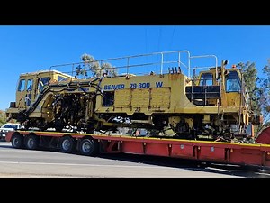 Gradco Heavy Haulage TasRail TT6 Beaver 79-800 W Ballast Tamper on Gradco truck