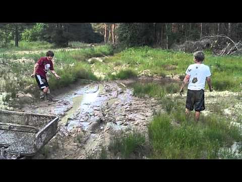 Boys playing in the mud