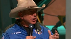 Jeff Bezos, Blue Origin celebrate first manned flight