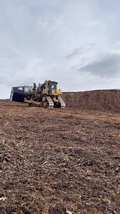 97K views · 3.5K reactions | Cat D9 on retreat for another blade full of hog fuel, mixture of tree bark and other tree bits, that is consumed (burned) to generate electricity. D9 stockpiles the product adjacent to the facility | Earthmovers Media | Facebook