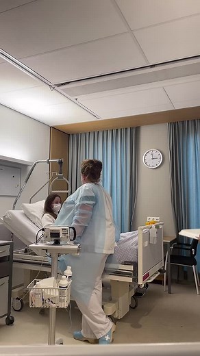 Healthcare Workers Dance Celebration in Hospital Room