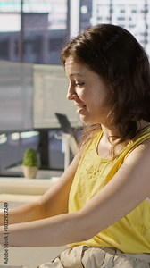 Vertical video Cheerful manager in wheelchair doing high five with employee testing machine learning software. Team leader with disability saluting worker, doing friendly gesture, camera A