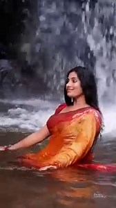 Indian sexy woman in wet saree
