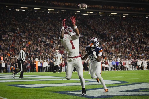 Alabama's Kalen DeBoer shakes hands with Indiana's Curt Cignetti & leaves the field at the Rose Bowl