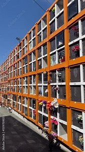 Memorial Architecture: A Building of Windows Honoring the Cremated, Symbolizing Reflection and Remembrance in Urban Spaces
