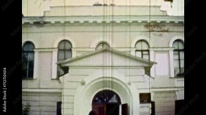 Mother, children walk to historic European building. Family walk in old town. Tourist visits to famous museum. Happy holidays. Woman, kids at Europe vacation. Vintage color film. Retro archive 1980s