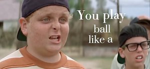 The Sandlot (1993) captures a version of childhood that isn’t about innocence as much as it’s about intensity — the way summers feel endless, friendships feel permanent, and small moments carry the weight of legend. The film isn’t driven by plot so much as memory, shaped by the feeling of looking back on a time when the world felt both enormous and close enough to touch. What gives the story its charm is how seriously it takes small stakes. Baseball games, neighborhood rivalries, myths about bac