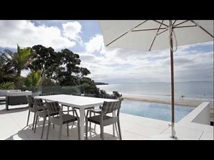 Outdoor Living Trends - Creating a beachfront infinity edge pool that blends with the landscape