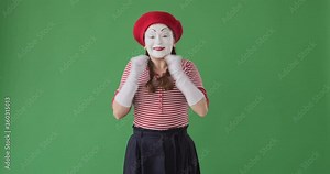 Astonished mime artist clapping hands and celebrating success Stock Video