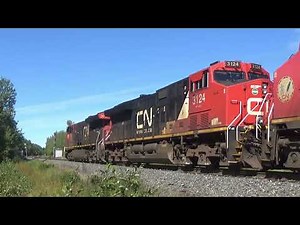 Huge Power Lashup on Manifest Train CN 305 passing Lutesville East approaching Berry Mills, NB