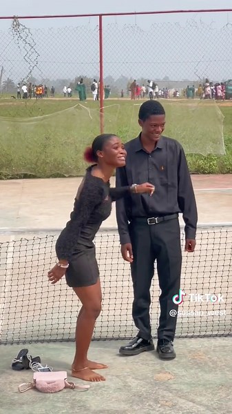 Don’t ask me either, I don’t know why he stood like that😭😂 plus it is giving couple vibes with the same color of outift😒🤎 #the_real_sussan_west #baby_wests #nigeriantiktok🇳🇬 #ghanadancers #matriculation