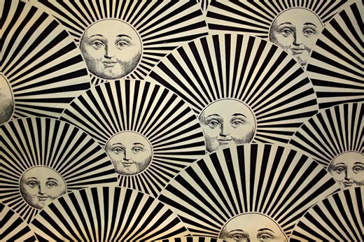 🎩✨ Step into the surreal world of Piero Fornasetti the visionary Italian artist who turned everyday objects into timeless works of art. From plates to cabinets, from chairs to candles, Fornasetti didn’t just design he enchanted. His muse? The enigmatic face of Lina Cavalieri, a 19th-century opera singer who became the most reimagined woman in design history. 🌕🌑 One face, a thousand expressions – floating in the moon, hiding behind a keyhole, whispering through the clouds… Fornasetti blended c
