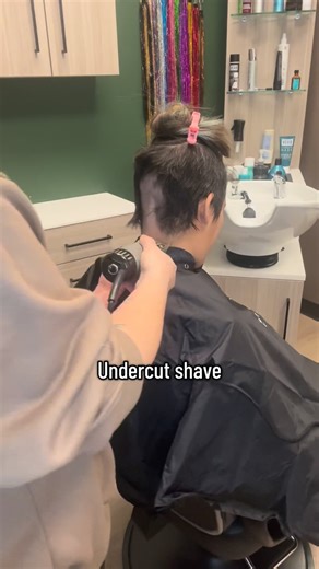 Jourdan Alfieri on Instagram: "Just a little undercut shave before we start the hair roulette transformation! Watch along for Ari’s hair journey ❤️ #undercut #headshave #hairstylist #cosmo #haircut #coloradospringshairstylist #althair #lgbtq #safespaces #coloradosprings #longhair #clippercut #hairtransformation"