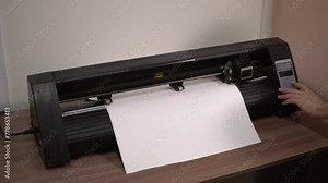 paper plotter. turn on the device. plotter for cutting vinyl. High-quality shooting in 4K format