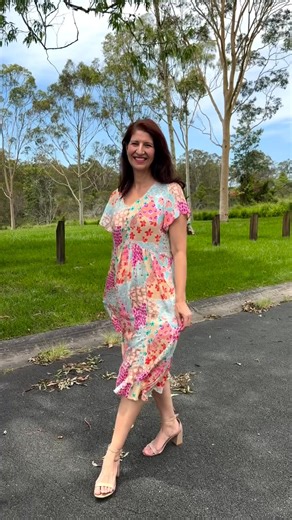 This sophisticated midi tunic dress celebrates understated elegance through its delicate floral print in sky blue, mocha, and purple. Constructed from lightweight rayon, it drapes beautifully in a flattering A-line cut that skims the body gracefully. The below-knee length provides refined coverage, while decorative front buttons introduce a subtle design detail. An effortless choice for those seeking colour and comfort without compromise Sz 10 to 18 available at I❤Tunics here: t.ly/IdgAM | I Lov