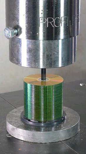 Hydraulic Press Channel | 💥😬Pile Of CDs Explosing Under Hydraulic Press👀 #hydraulicpress #crush #explosion #cd #satisfyingvideos | Instagram