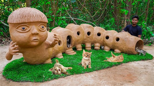 A magical hand built caterpillar cat villa created for playful and rescued kittens