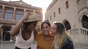 Cheerful lady having fun. Beautiful female tourist laughing and walking. Summer and vacation concept