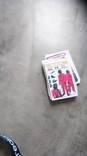 Interactive Card Stacking on Concrete Floor
