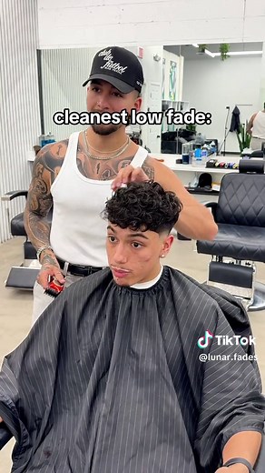 Stylish Low Fade with Textured Curly Top