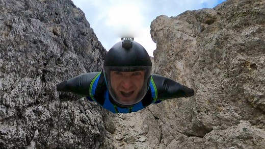 Wingsuit BASE Jump through a Crack | 360 VR