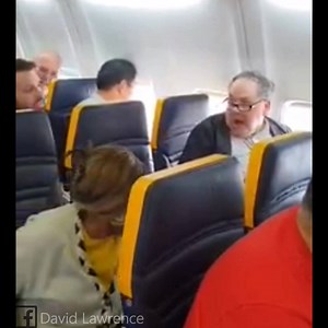 A racist Ryanair passenger refuses to sit next to an elderly black woman A video uploaded yesterday to Facebook by David Lawrence, captures an older white man yelling racist insults such as "YOU UGLY BLACK BASTARD," at an elderly black woman sitting in the same row on a Ryanair flight. He continues to even threaten to push the woman off her seat if she doesn't move. The woman was relocated to another seat and the man was allowed to continue on his journey. Lawrence took to social media to highli