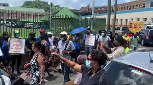 13K views · 98 reactions | Few protesters gather outside a building where Senator Ashelle Morgan works. They are demanding that she should resign | St Vincent Times | Facebook