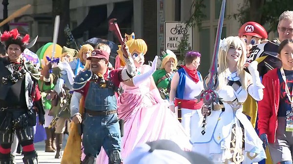 Dragon Con parade filled with colorful costumes in downtown Atlanta