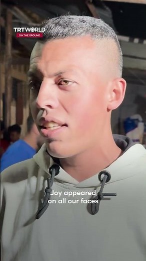 Palestinians in Gaza gather to cheer their national team in the Arab Cup